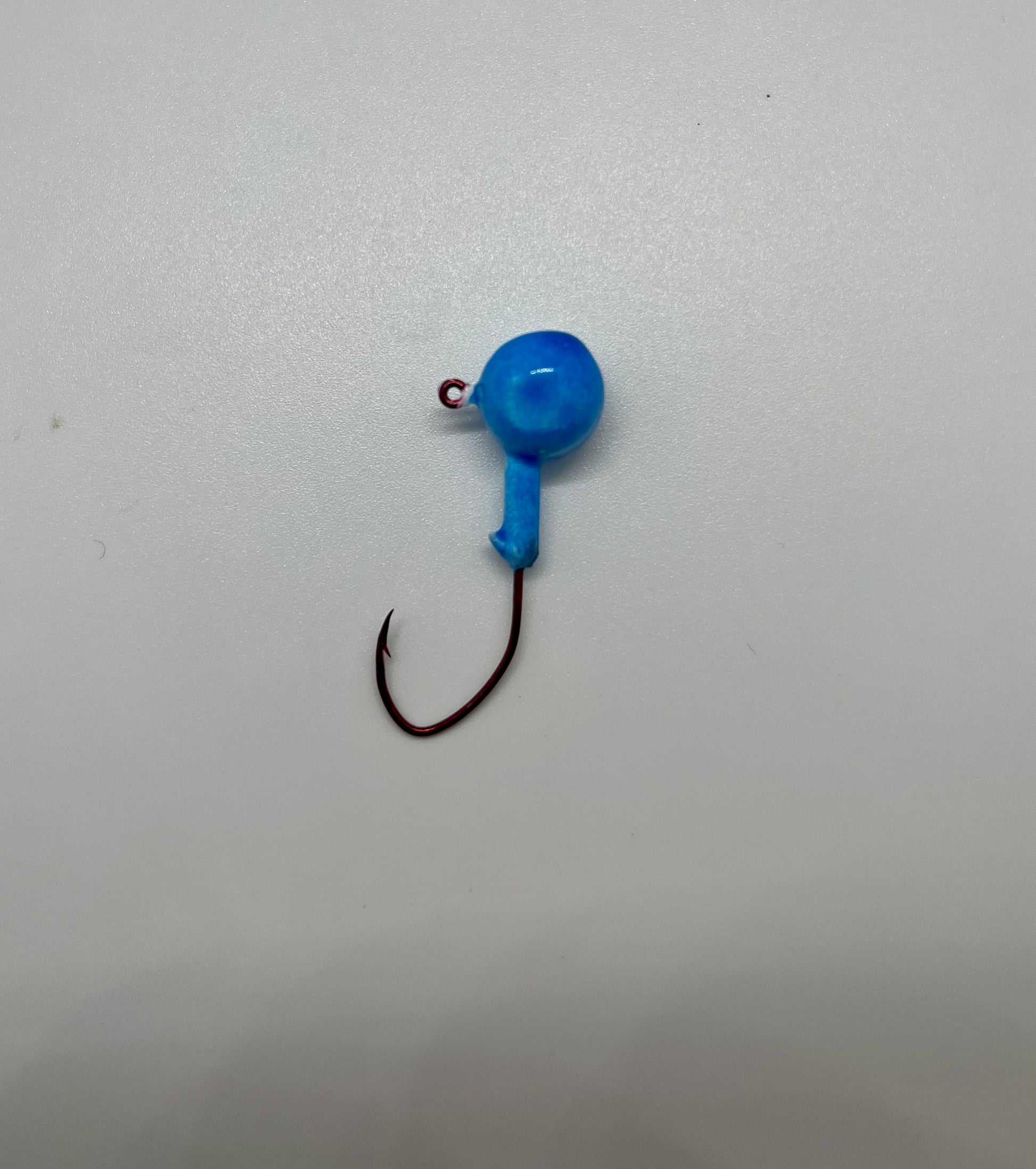 Blue Glow in the Dark Jig with Red Eagle Claw Hook