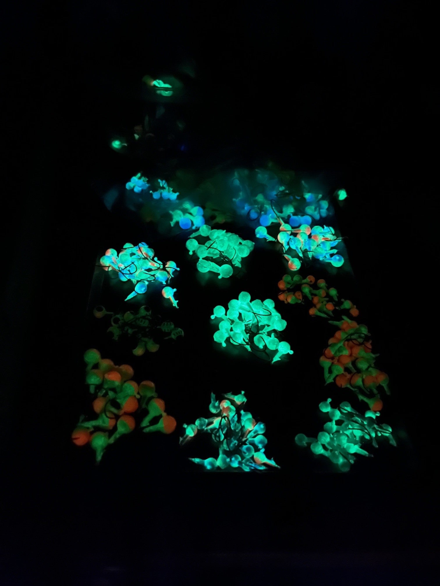 Numerous Glow in the Dark Jigs with Red Eagle Claw Hook